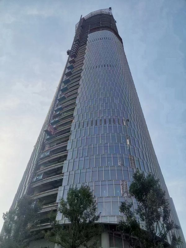 China Manufacturer Directory Sale Durable Steel Structural Frame Commercial High Rise Building Office Steel Structure